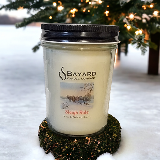 sleigh ride soy candle in the snow