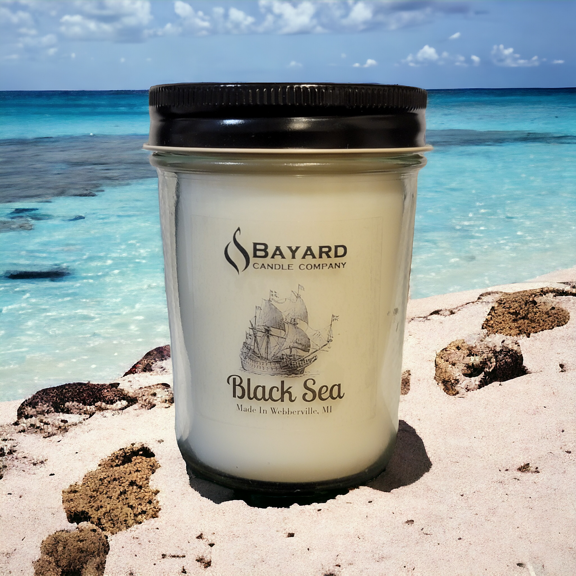 Black Sea Soy Candle on a Caribbean beach