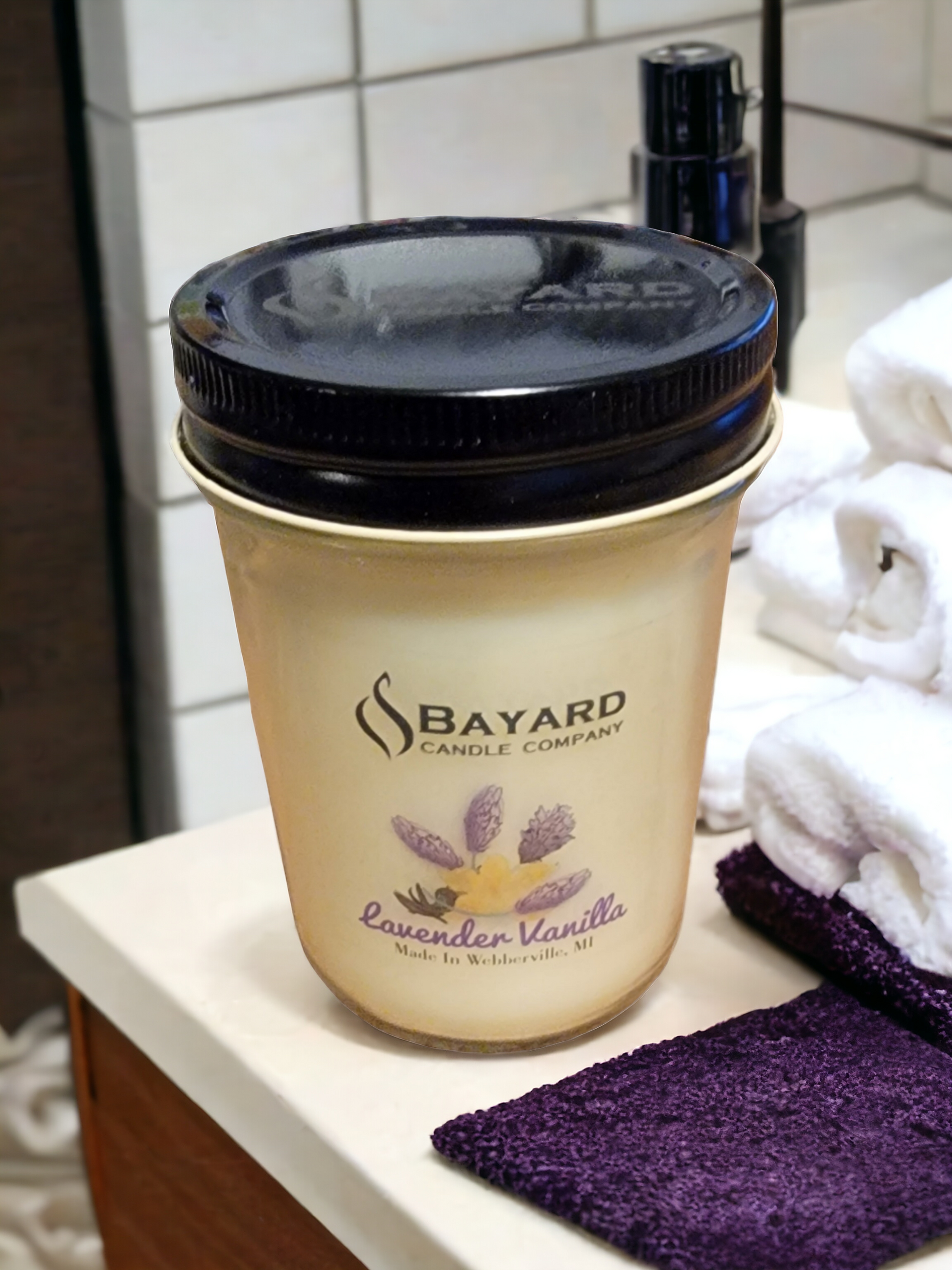 Lavender Vanilla Soy Candle in a bathroom setting