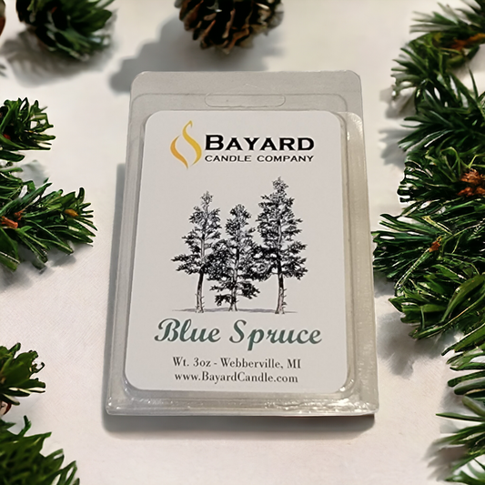 blue spruce soy wax melt on table