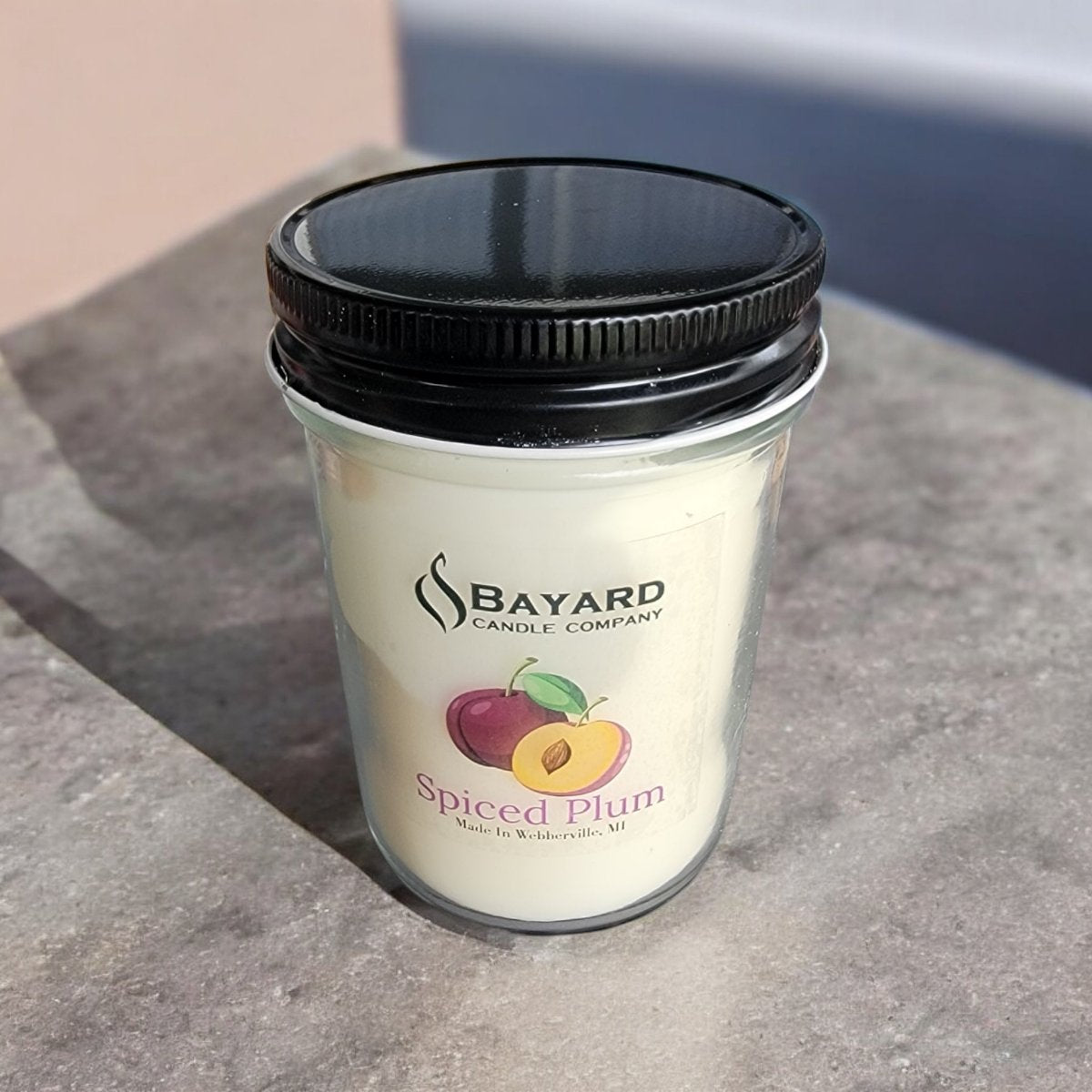 Spiced Plum Soy Candle 8oz on concrete counter