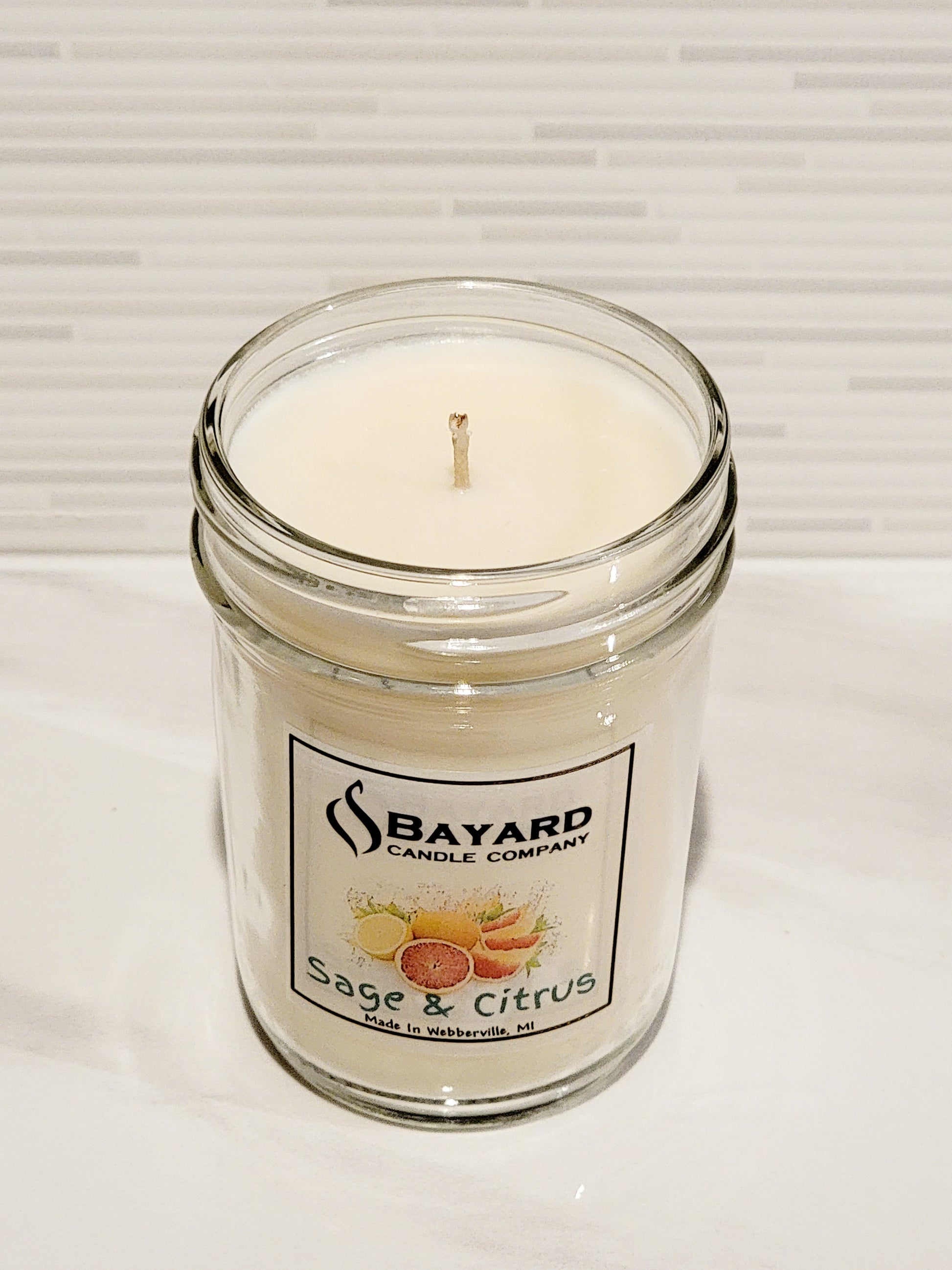 Sage and Citrus Soy Candle with the top off