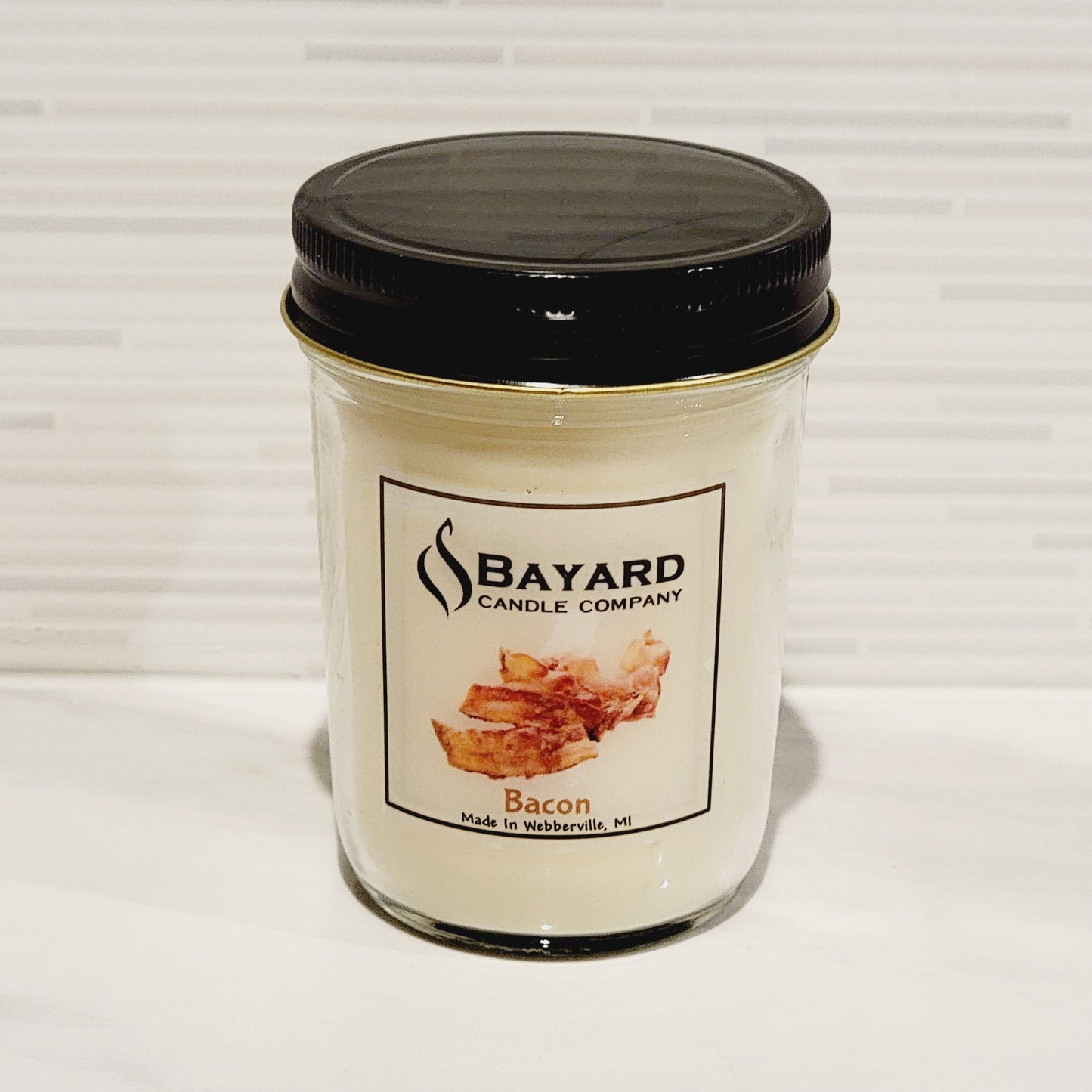 bacon soy candle on a counter