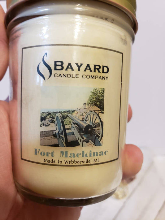 Fort Mackinac Soy Candle in a hand